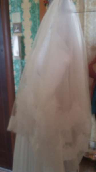 Шуба мутоновая, свадебное платье в Перми фото 8
