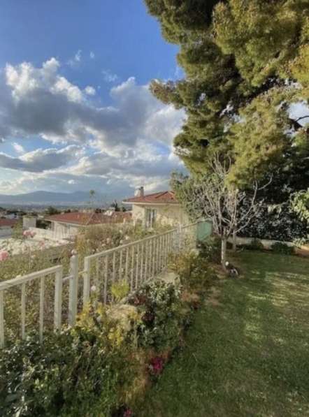 Просторная вилла с террасой и садом, Кифисья, Греция в фото 4