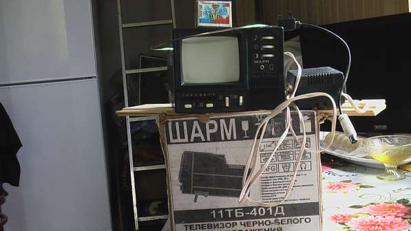 Дорожный черно белый мини телевизор Шарм в Саратове фото 9
