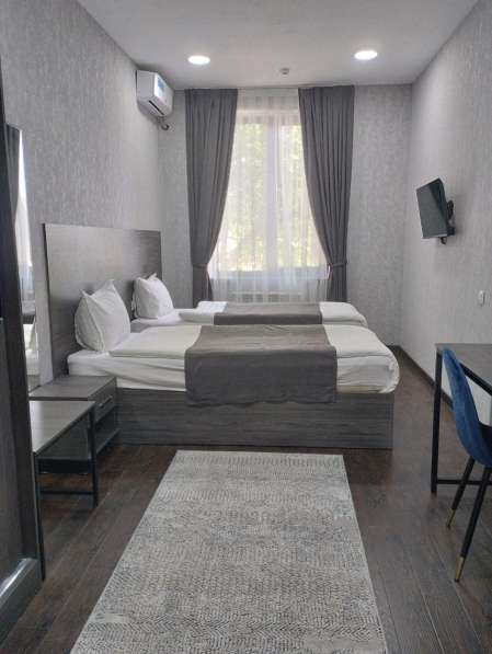 Xaziniy Hotel в фото 13