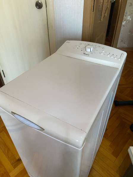 Стиральная машинка с вертикальной загрузкой