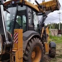 Продам экскаватор погрузчик John Deere, 2012г/в, в Перми